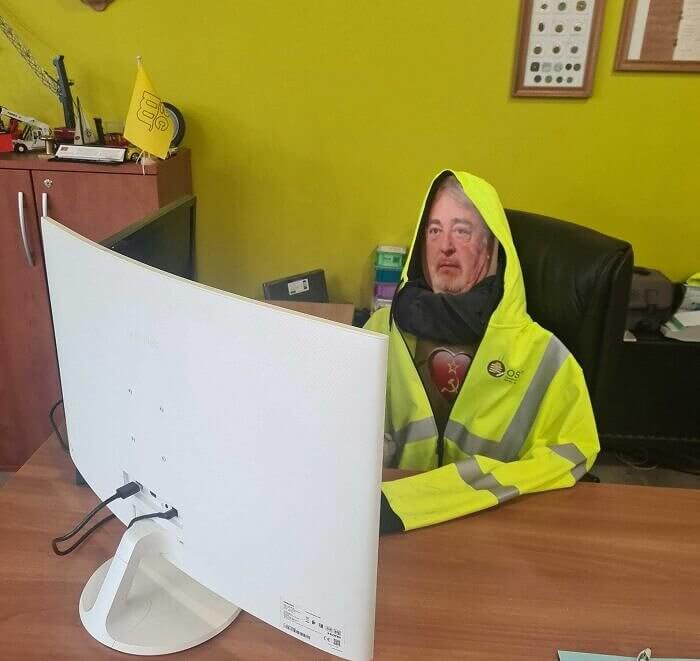 Cardboard Boss Keeps the Office in Check